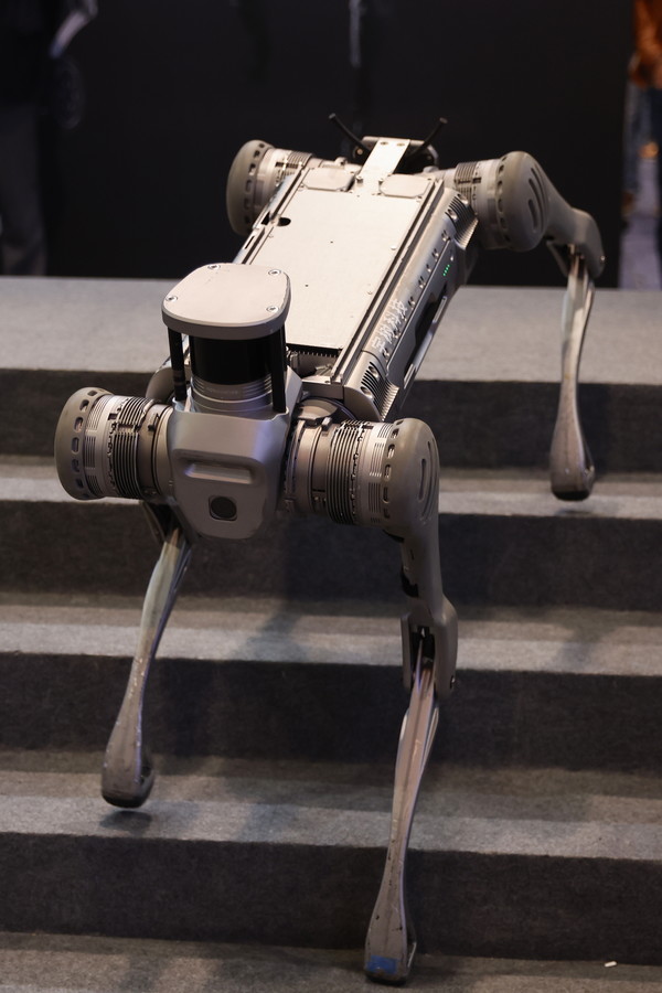epa11066707 Unitree's industrial-grade quadruped robot, B2, goes down a set of stairs during the 2024 Consumer Electronics Show (CES) at the Las Vegas Convention Center in Las Vegas, Nevada, USA, 09 January 2024. CES, the world's largest annual consumer technology trade show, is a place where industry manufacturers, advertisers and tech-minded consumers converge to get a taste of new innovations coming to the market each year. CES takes place from 09-12 January 2024. EPA/CAROLINE BREHMAN